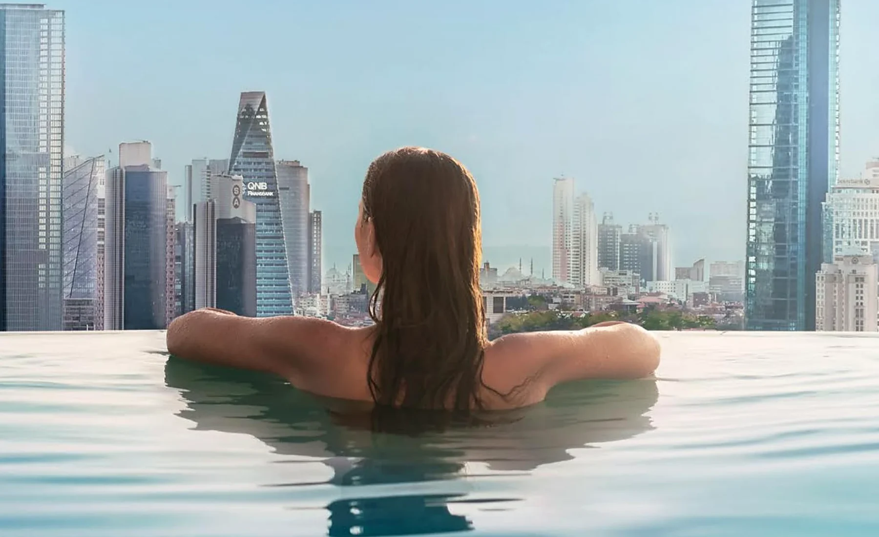 Infinity pool overlooking the Maslak skyline at ETRO Residences Istanbul