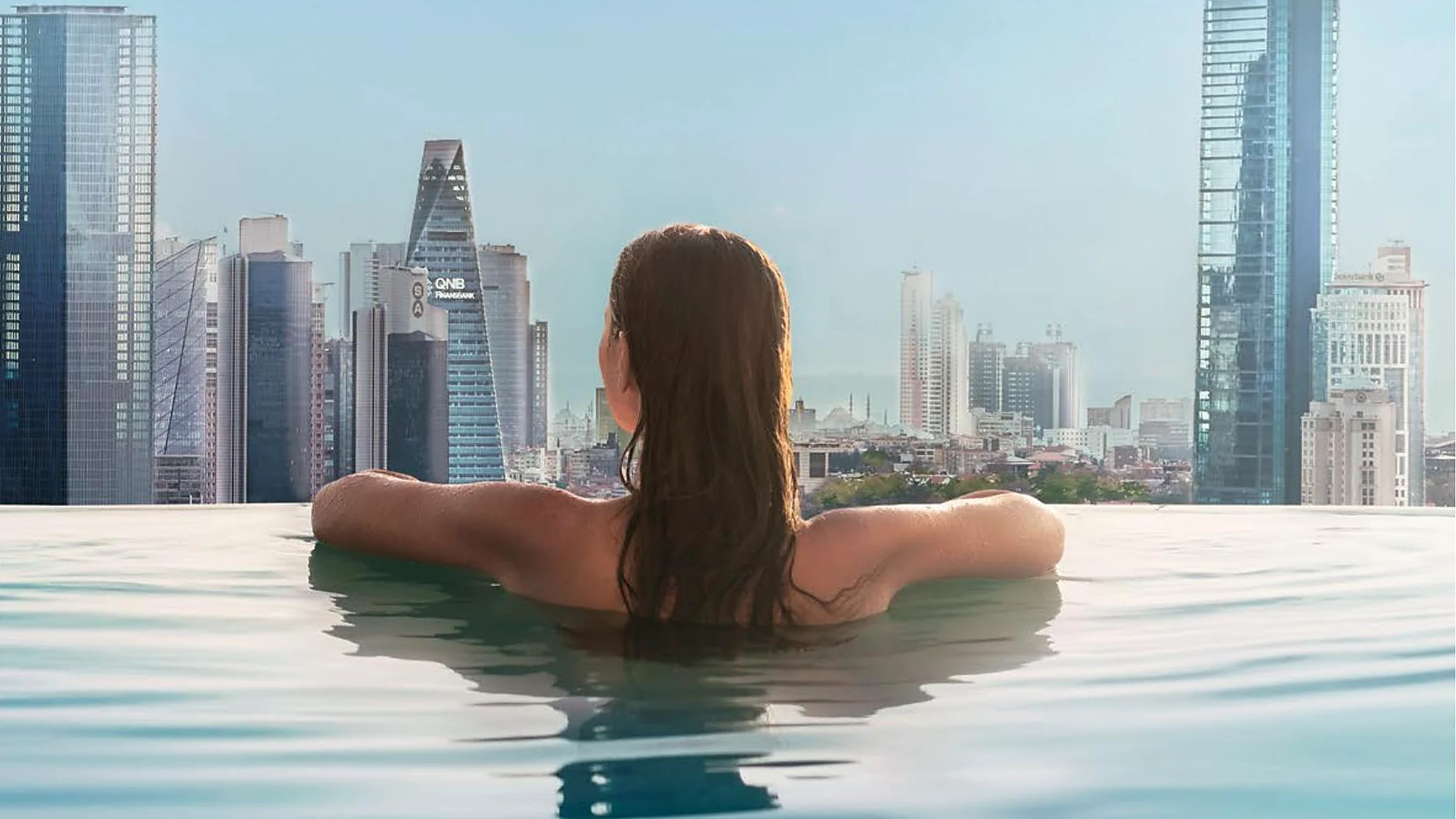 Infinity pool overlooking the Maslak skyline at ETRO Residences Istanbul