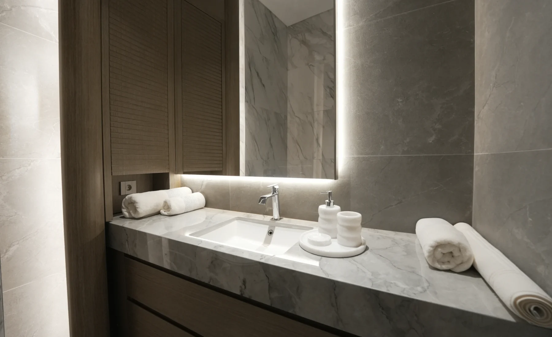 Marble bathroom vanity in the 1+1 show residence